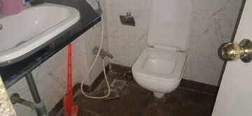 Bathroom in 2 BHK Apartment at Riddhi Gardens CHS, Malad East – for Rent