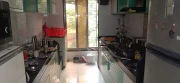 Kitchen in 2 BHK Apartment at Riddhi Gardens CHS, Malad East – for Rent