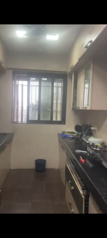 Kitchen in 2 BHK Apartment at Darvesh Residency Agripada, Agripada – for Rent