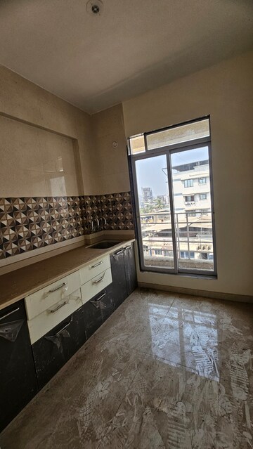 Kitchen in 2 BHK Apartment at Dombivli West – for Sale