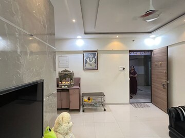Living Room in 1 BHK Apartment at Delta Vrindavan, Mira Road – for Sale