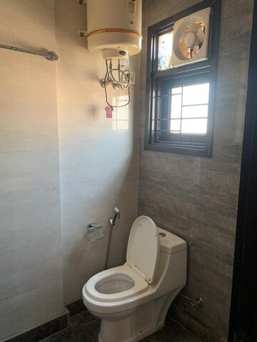 Bathroom in 2 BHK Apartment at Palm Residency Chhatarpur, Chattarpur – for Rent