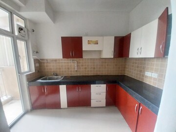 Kitchen in 2 BHK Apartment at Mahagun Mywoods III, Sector 16c Greater Noida – for Rent
