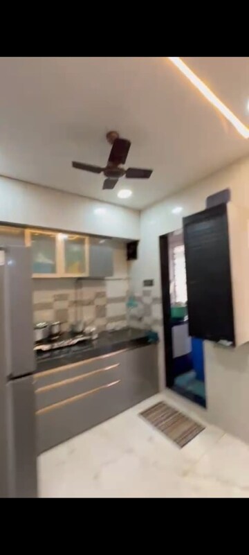 Kitchen in 1 BHK Apartment at Jamuna Tower, Mira Road – for Sale