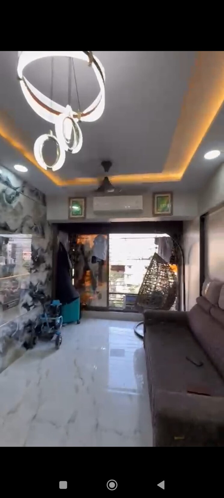 Living Room, jamuna-tower 1 Bedroom 610 Sq.Ft. Apartment In Mira Road Thane 9112905