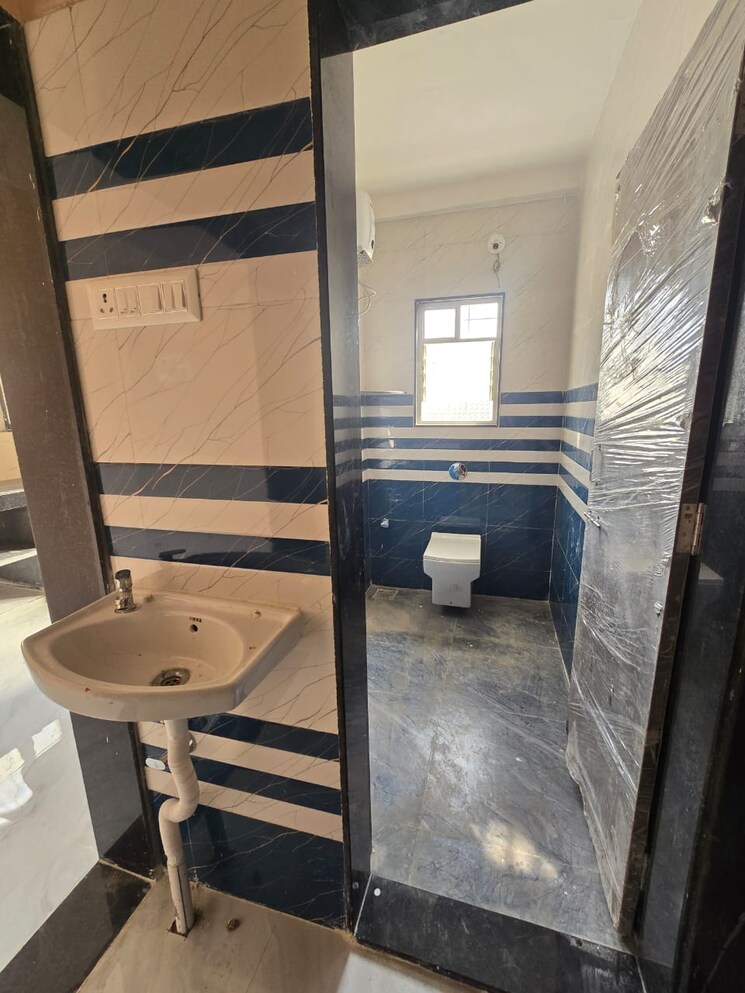 Bathroom, bhakti-plaza-dhanori 1 Bedroom 573 Sq.Ft. Apartment In Dhanori Pune 9112940