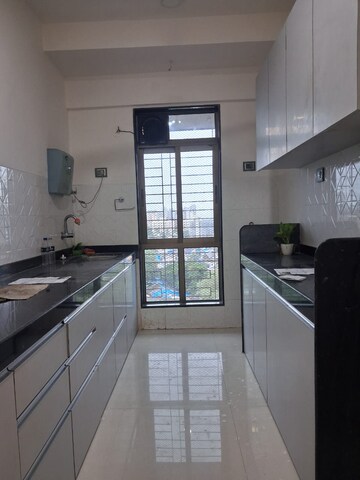 Kitchen in 2 BHK Apartment at Shiv Shakti Tower 28, Malad East – for Rent