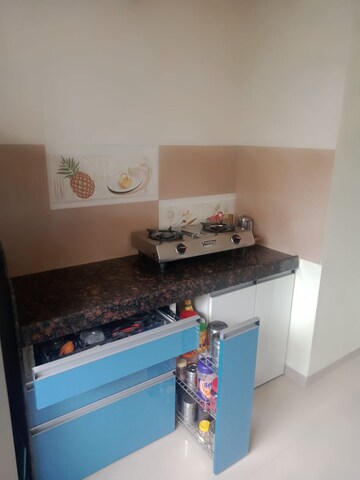 Kitchen in 1 BHK Apartment at Kalpa Taru Siddhachal III, Vasant Vihar – for Rent