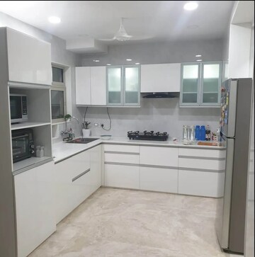 Kitchen in 3 BHK Apartment at Hiranandani Estate Rodas Enclave, Ghodbunder Road – for Rent