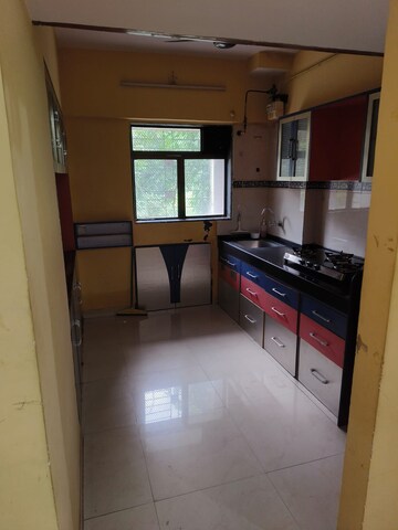 Kitchen in 2 BHK Apartment at Arjun CHS Vasant Vihar, Vasant Vihar – for Rent