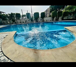 Swimming Pool in 4 BHK Apartment at Ratan Galaxy, Vrindavan Yojna – for Sale