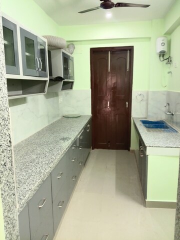 Kitchen in 3 BHK Apartment at RWA Apartments, Sector 31 – for Rent