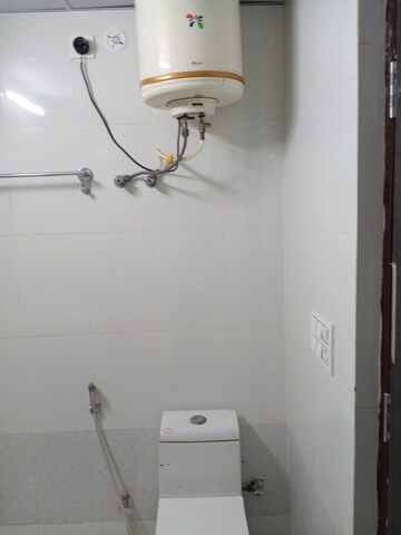 Bathroom in 3 BHK Apartment at RWA Apartments, Sector 31 – for Rent