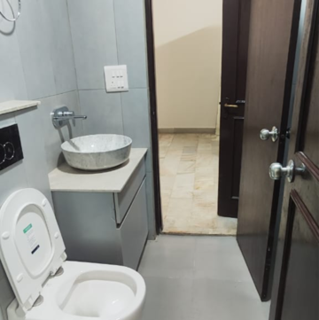 Bathroom in 3 BHK Builder Floor at Boutique Residential Apartments C-220, Sarvodaya Enclave – for Rent