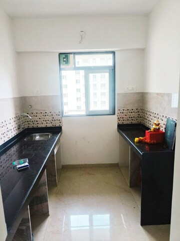 Kitchen in 1 BHK Apartment at Mahavir Square, Manpada – for Rent