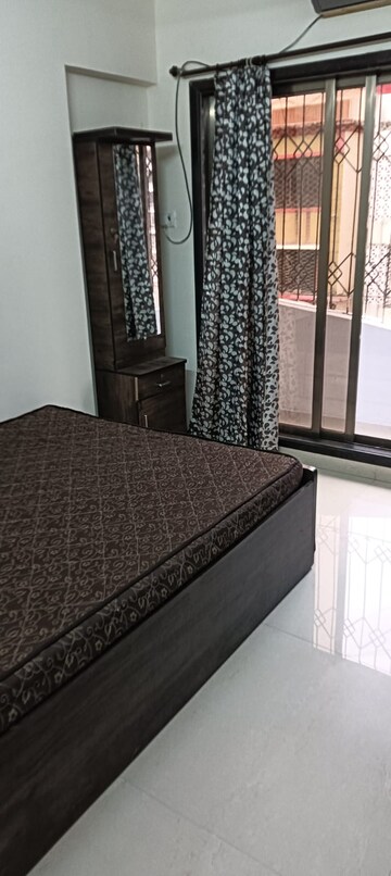 Bedroom in 2 BHK Apartment at K Raheja Palm Court, Malad West – for Rent