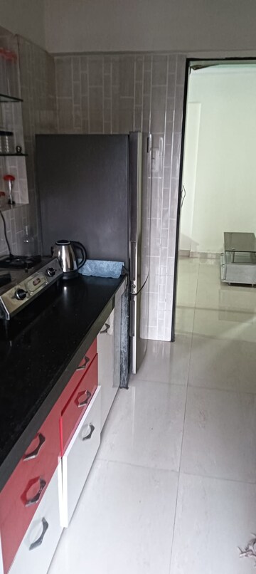 Kitchen in 2 BHK Apartment at K Raheja Palm Court, Malad West – for Rent