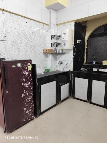 Kitchen in 2 BHK Apartment at Madhu Residency Andheri, Sher E Punjab Colony – for Rent