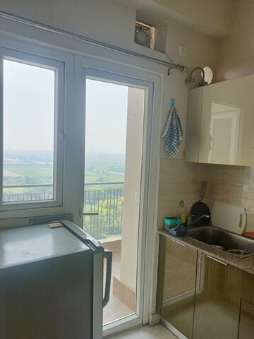 Kitchen in 3 BHK Apartment at T Homes Phase 1, Siddharth Vihar – for Rent