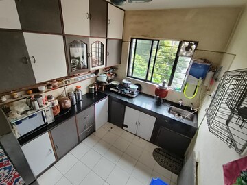 Kitchen in 2 BHK Apartment at New Era CHS, Gultekdi – for Rent