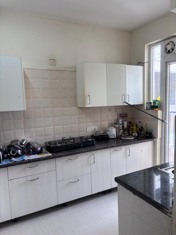 Kitchen in 2 BHK Apartment at NK Sharma Savitry Greens, Lohgarh – for Rent