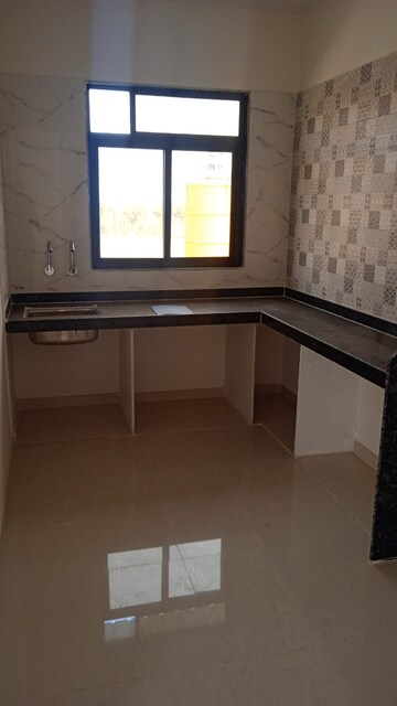 Kitchen in 1 BHK Apartment at Raj Tulsi City, Badlapur East – for Sale