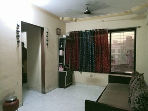 Living Room in 1 BHK Apartment at Mandar Heights, Virar West – for Sale