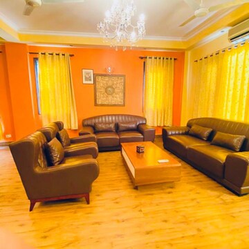 Living Room in 2 BHK Builder Floor at DLF The Royalton Tower, Golf Course Road – for Rent