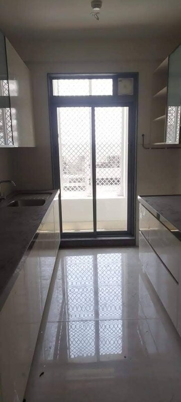 Kitchen in 2 BHK Apartment at Piramal Vaikunth, Balkum Pada – for Rent
