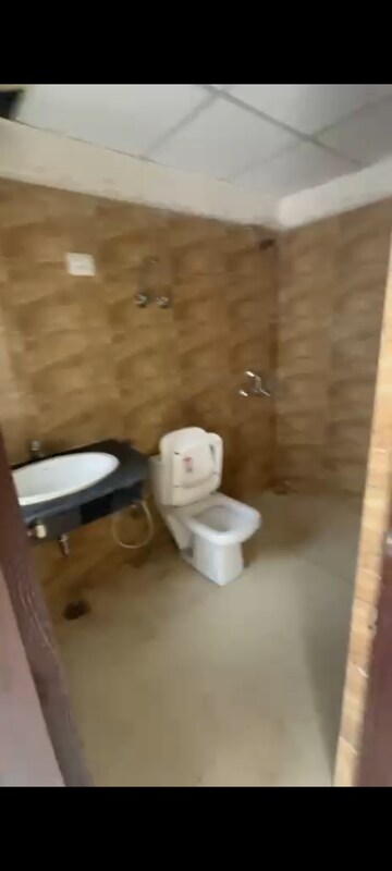 Bathroom in 2.5 BHK Apartment at VVIP Homes, Gaur City 2 – for Sale