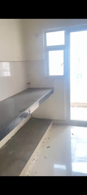 Kitchen in 2.5 BHK Apartment at VVIP Homes, Gaur City 2 – for Sale