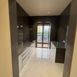 Kitchen in 3 BHK Apartment at Mohan Altezza, Wayle Nagar – for Sale