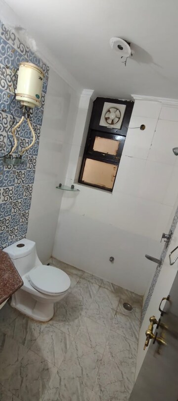 Bathroom in 3.5 BHK Apartment at Abhinandan CGHS, Sector 51 – for Rent