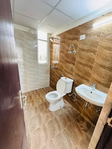 Attached Bathroom in 3 BHK Apartment at Amrapali Crystal Homes, Sector 76 – for Rent