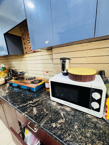 Kitchen in 3 BHK Apartment at Aims Golf City, Sector 75 – for Rent