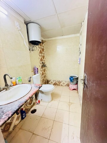 Bathroom in 3 BHK Apartment at Aims Golf City, Sector 75 – for Rent
