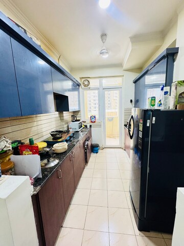 Kitchen in 3 BHK Apartment at Aims Golf City, Sector 75 – for Rent