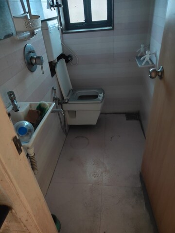 Bathroom in 1 BHK Apartment at Woodland Apartment, Andheri West – for Rent