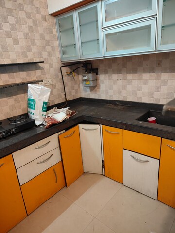 Kitchen in 1 BHK Apartment at Woodland Apartment, Andheri West – for Rent