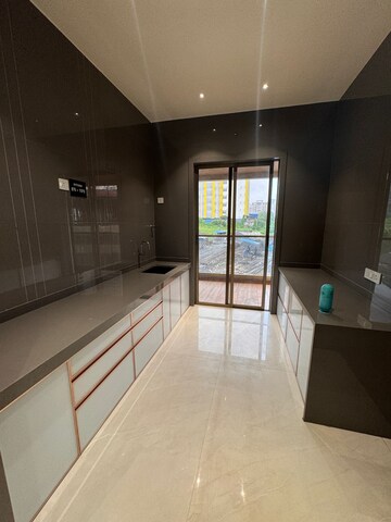 Kitchen in 2 BHK Apartment at Mohan Altezza, Wayle Nagar – for Sale