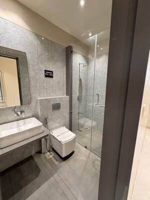 Bathroom in 4 BHK Apartment at Mohan Altezza, Wayle Nagar – for Sale