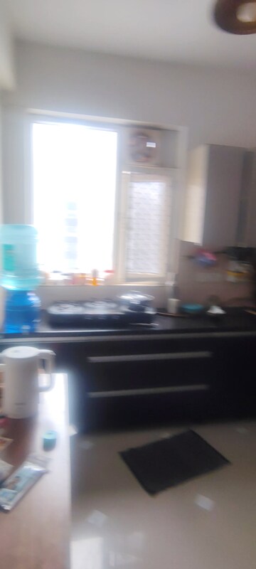 Kitchen in 1 BHK Apartment at Urbtech Xaviers, Sector 168 – for Rent