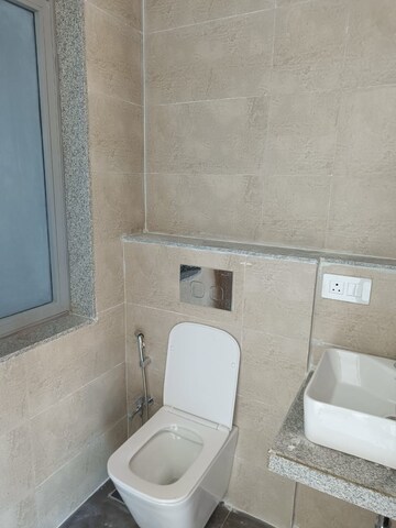 Bathroom in 2 BHK Apartment at Dynamix Avanya, Dahisar East – for Rent