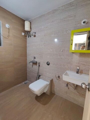 Bathroom in 3 BHK Apartment at Cosmos Jewels, Ghodbunder Road – for Rent