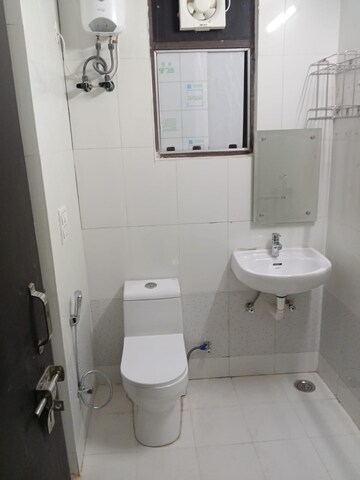 Bathroom in 3 BHK Builder Floor at RWA Apartments, Sector 31 – for Rent