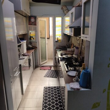 Kitchen in 3 BHK Apartment at Amrapali Zodiac, Sector 120 – for Rent