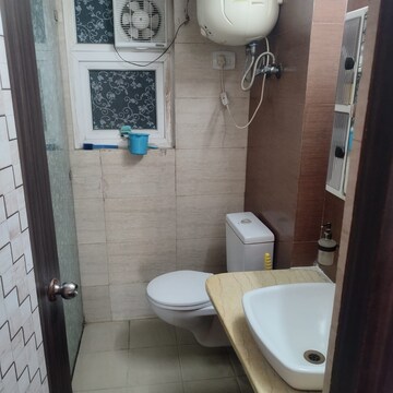 Bathroom in 3 BHK Apartment at Amrapali Zodiac, Sector 120 – for Rent