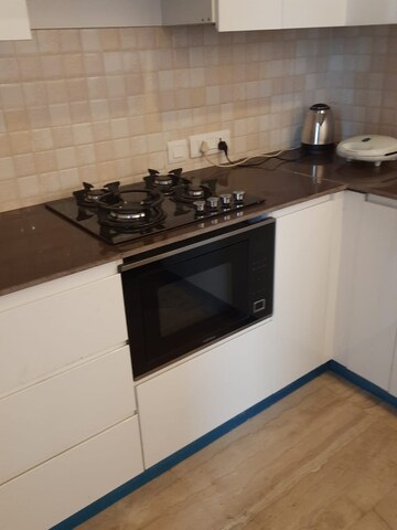 Kitchen in 3 BHK Apartment at Supertech Supernova Spira Suites, Sector 94 – for Rent