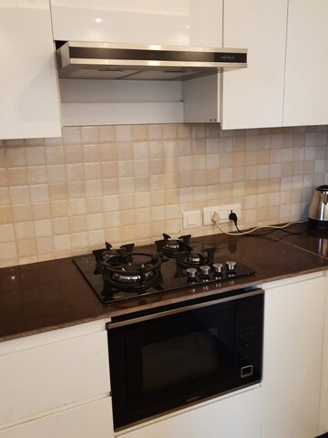 Kitchen in 3 BHK Apartment at Supertech Supernova Spira Suites, Sector 94 – for Rent