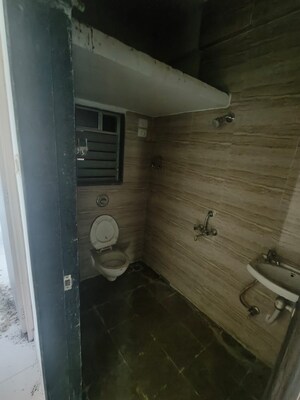 Bathroom in 1 BHK Apartment at Arok Kinjal Residency, Agripada – for Sale